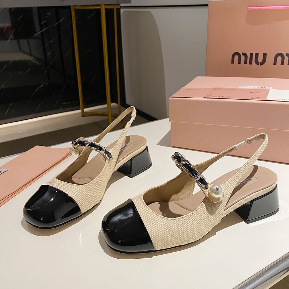 MIUMIU Patent leather and raffia slingback pumps